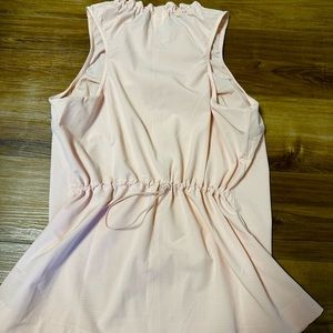 Never worn, rosewater tank from Athleta with a cinched waist